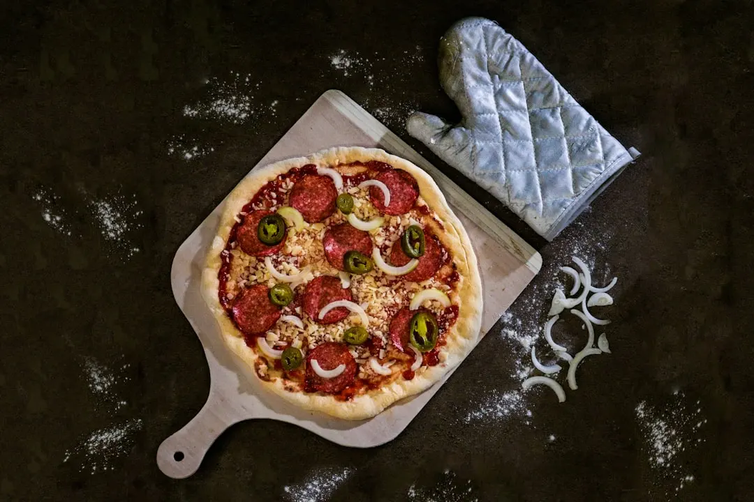 pizza on brown wooden tray